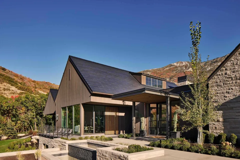 Three Falls Revist Vulcan Cladding in Protector Graphite Abodo Wood 01