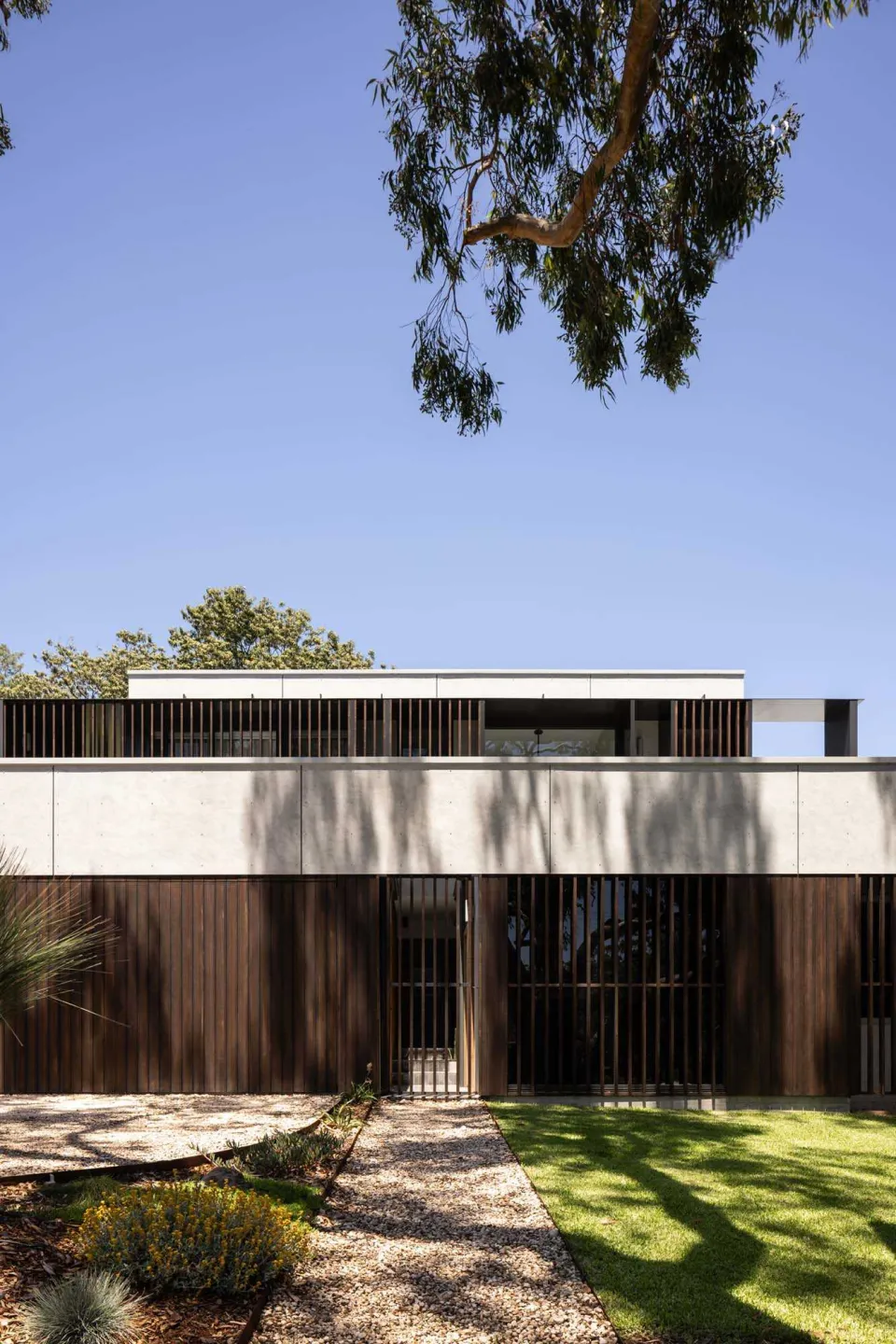 Shakespeasre House Vulcan Cladding and Vulcan Screening in Protector Walnut Abodo Wood 04