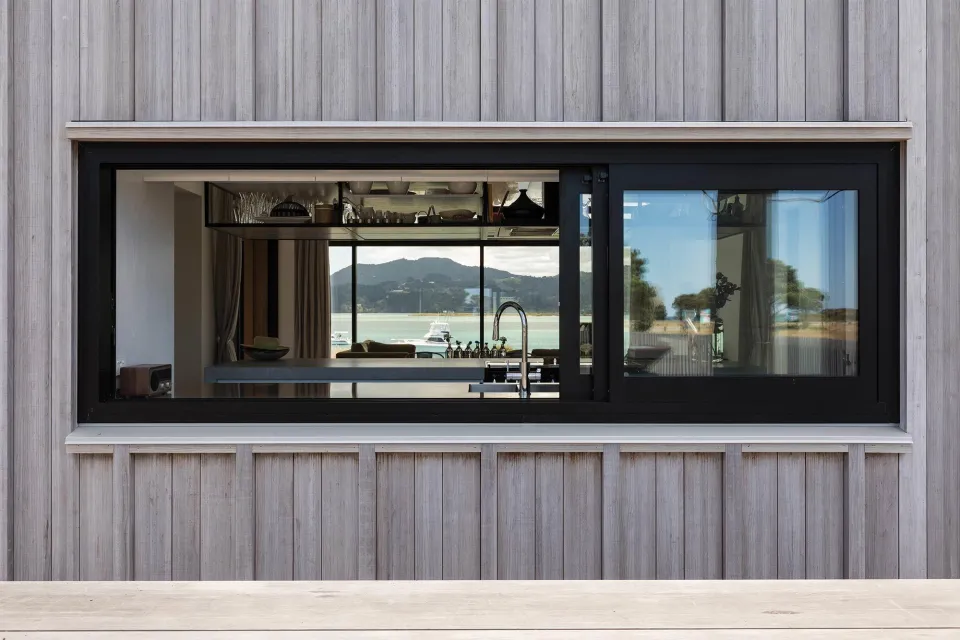 Omaha House Vulcan Cladding in Sioox Abodo Wood