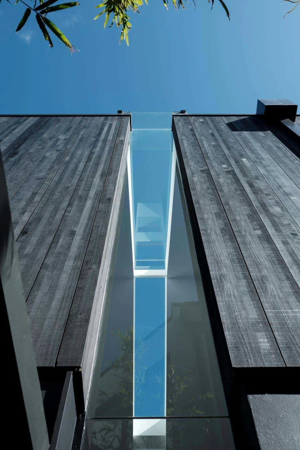 Semi Bold Vulcan Cladding in Nero Abodo Wood 5