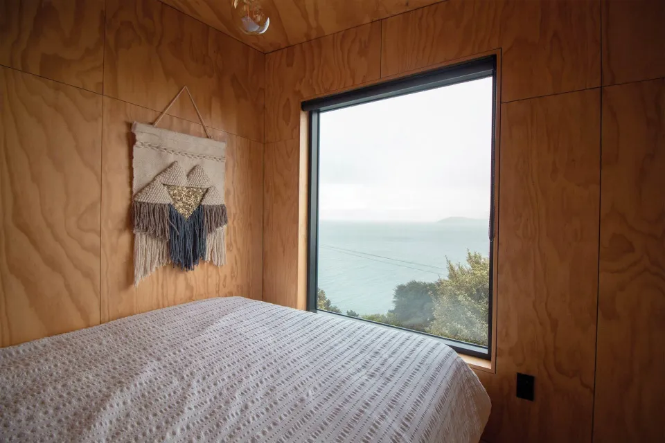 The Seagull Wing Cabin Tundra Cladding in Sioox Finish Abodo Wood 12