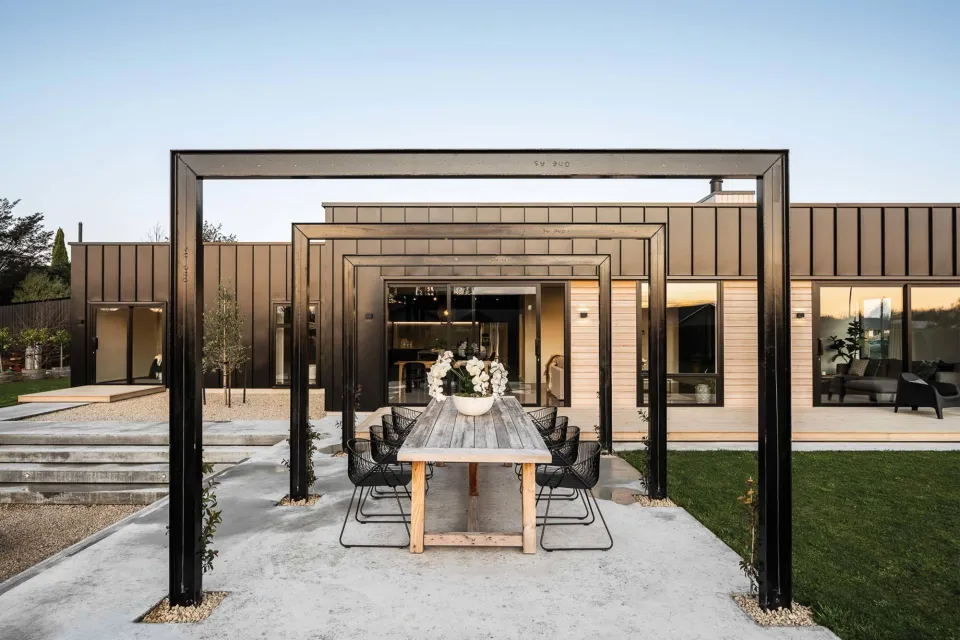 Amberley Family Home Vulcan Cladding in Sioox Finish Abodo Wood 9