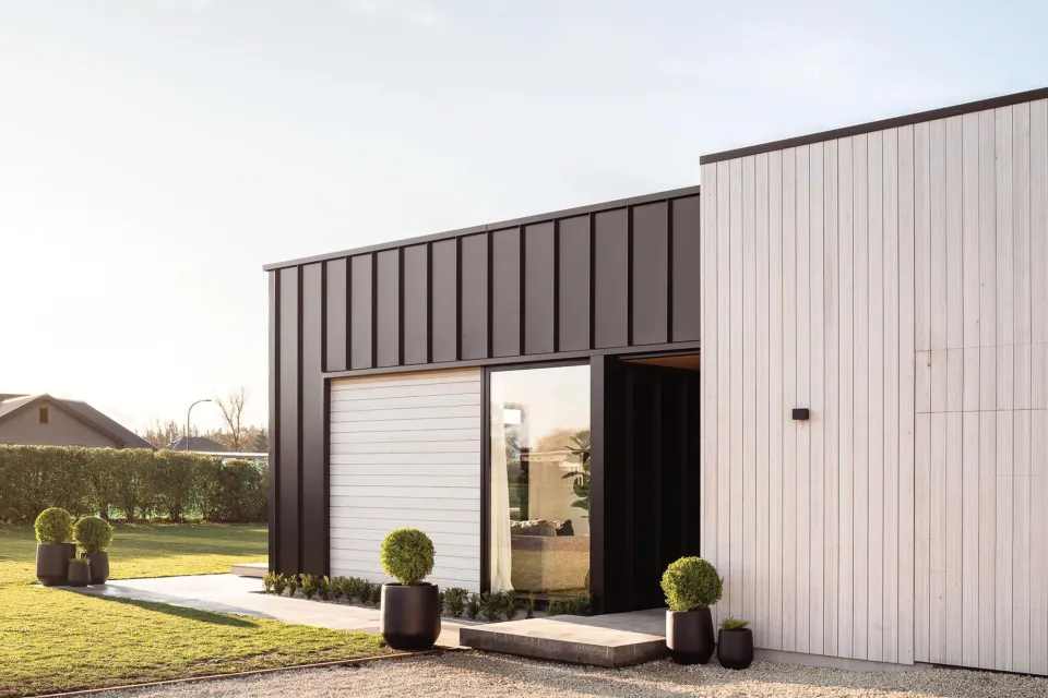 Amberley Family Home Vulcan Cladding in Sioox Finish Abodo Wood 8
