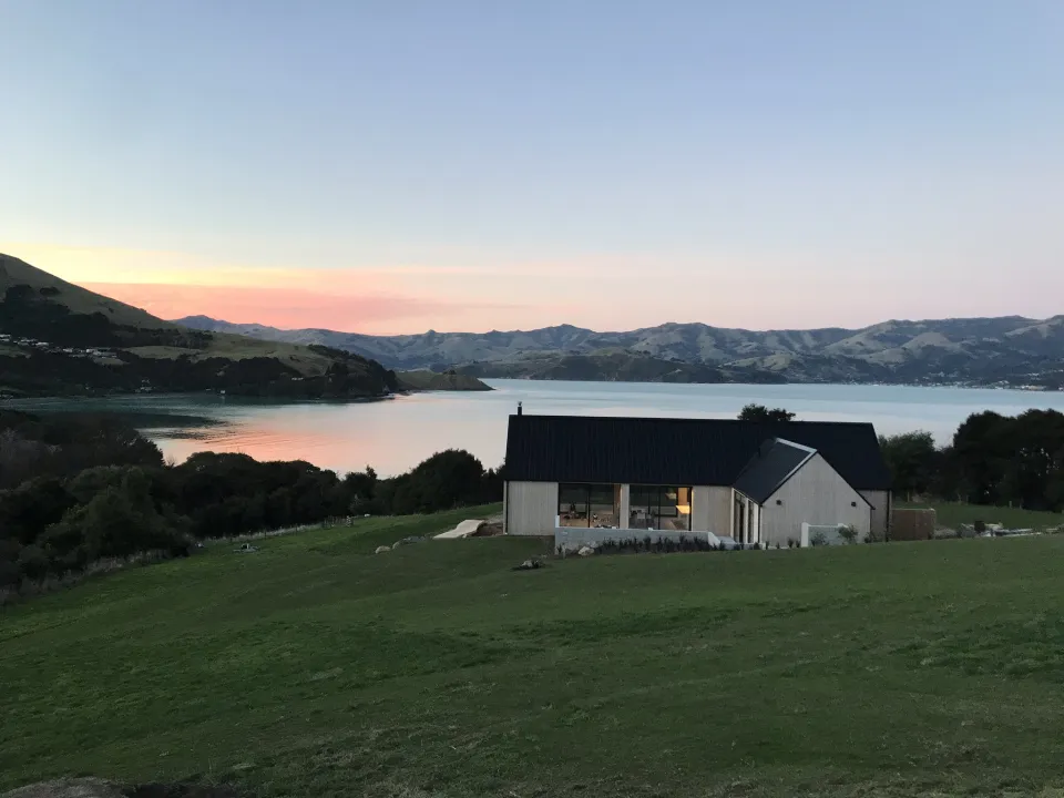 Coastal Banks Peninsula House Vulcan Cladding in Sioox finish Abodo Wood