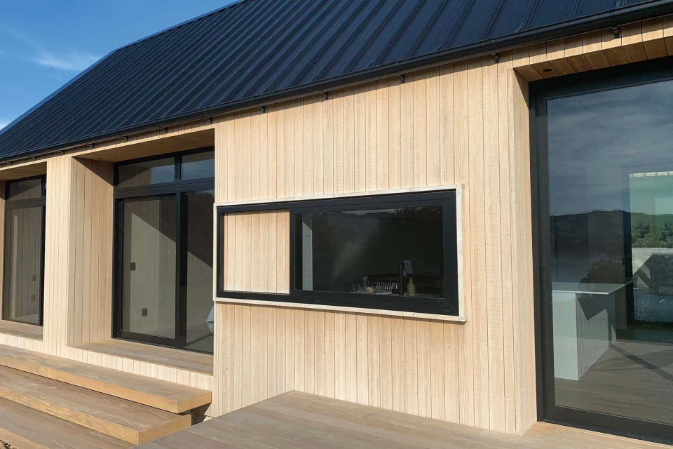 Coastal Banks Peninsula House Vulcan Cladding in Sioox finish Abodo Wood 3