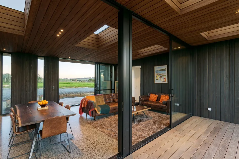 Box Living in Coastal Kaiwaka Vulcan Cladding Abodo Wood