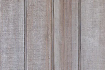 Vulcan Cladding Bandsawn Finish in Protector Patina